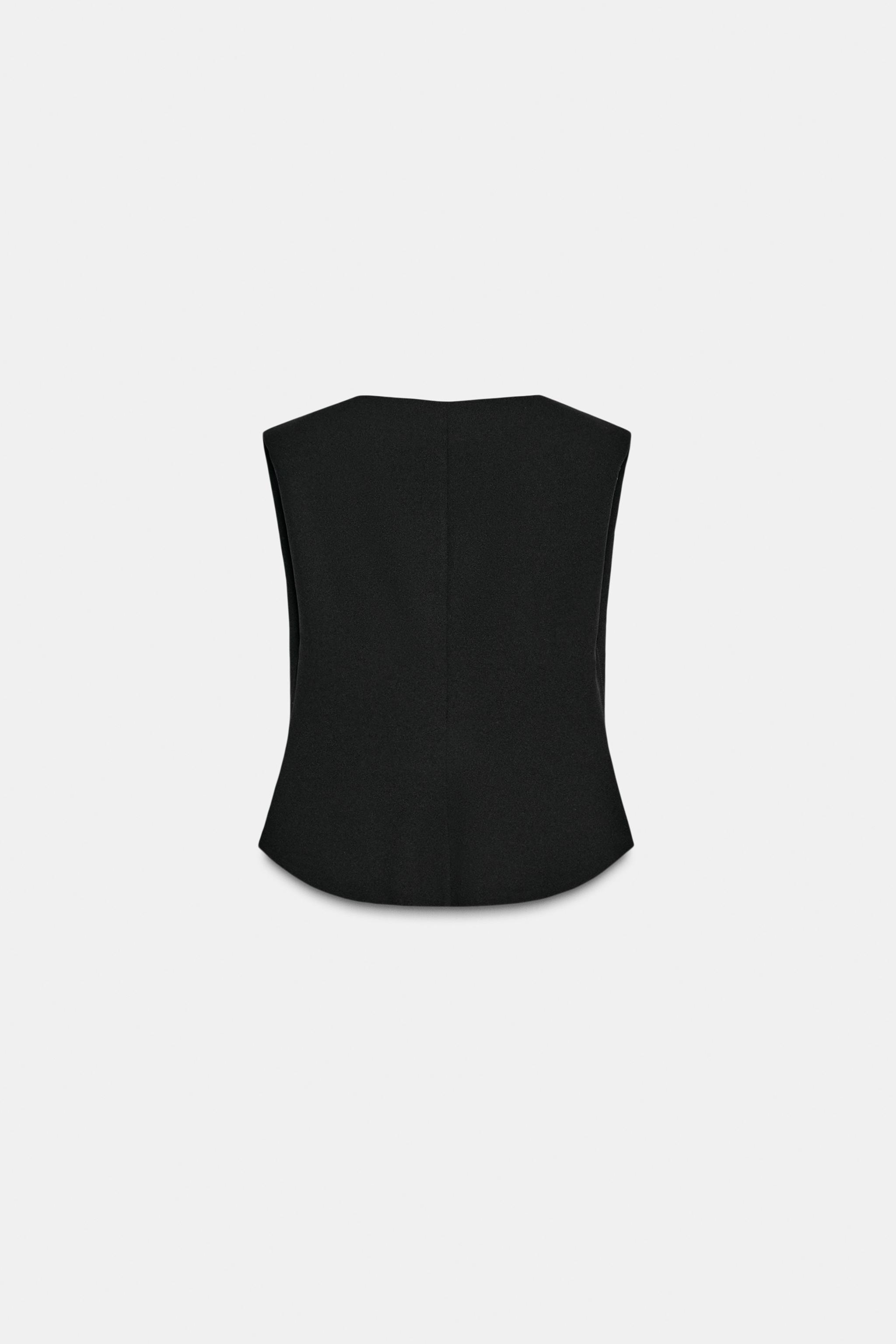 CREPE PEPLUM SHOULDER PAD TOP